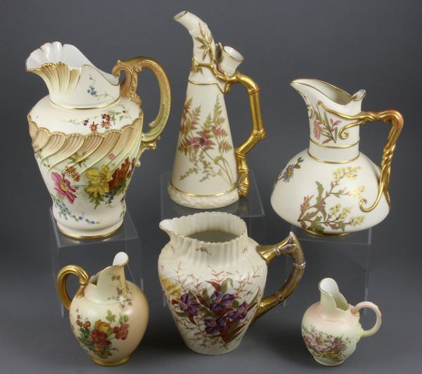 Appraisal: Collection of five Royal Worcester blush ivory handled pitchers to