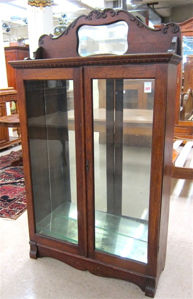 Appraisal: LATE VICTORIAN OAK CABINET BOOKCASE American c converted to a