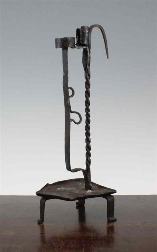 Appraisal: An iron double candle holder Continental th century with triangular