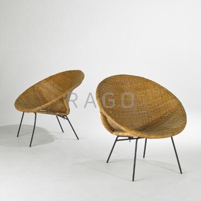 Appraisal: CALIFORNIA MODERN Pair of lounge chairs California s Woven wicker