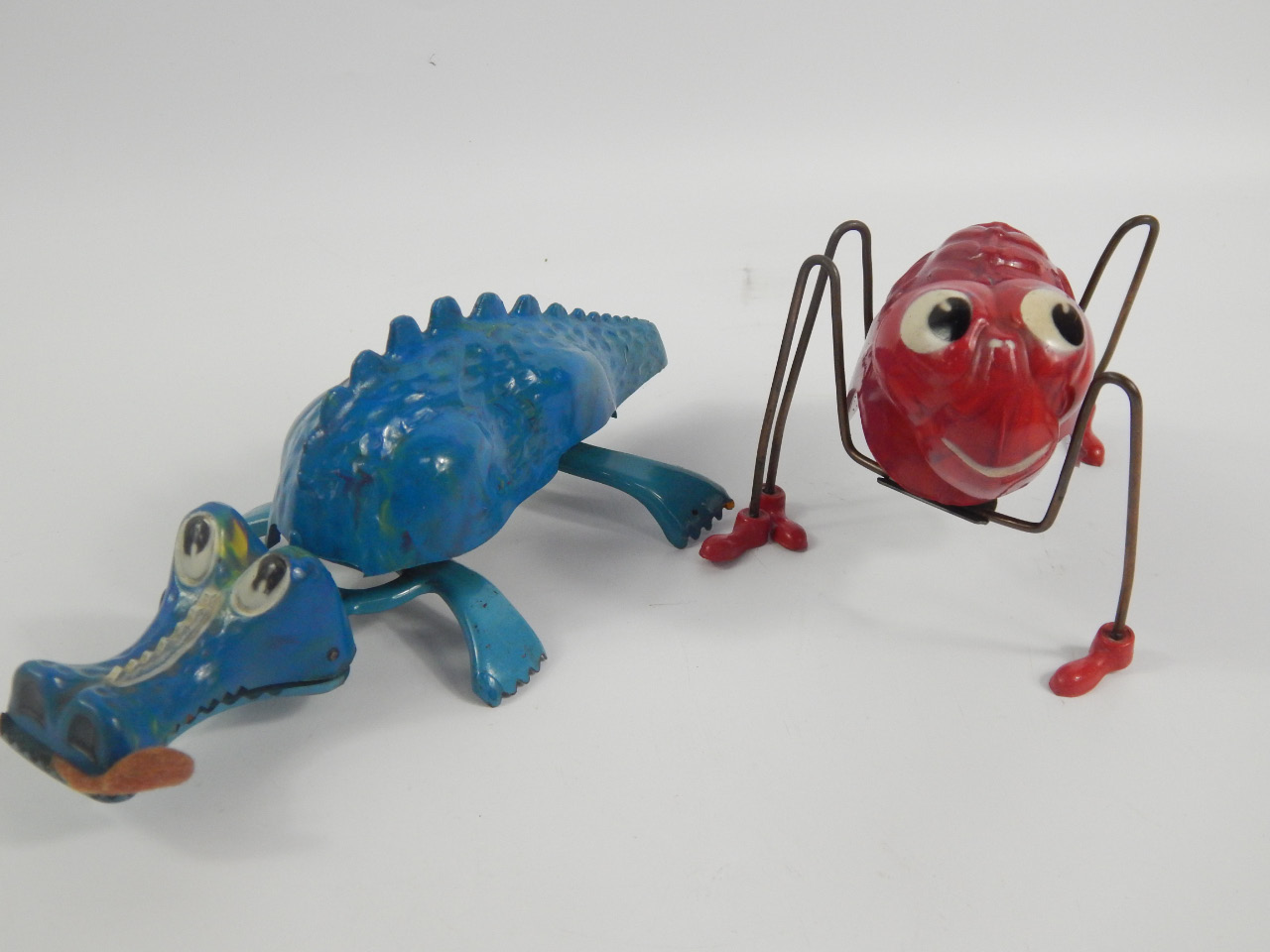 Appraisal: Two Tri-ang Minic clockwork toys comprising a Jabberwock and a