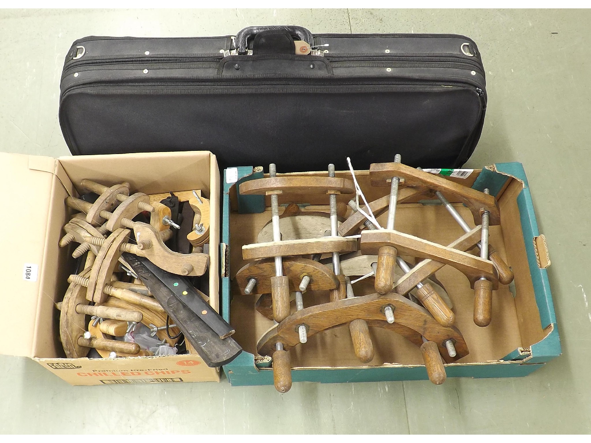 Appraisal: Box of various size turned wooden clamps and various fingerboards