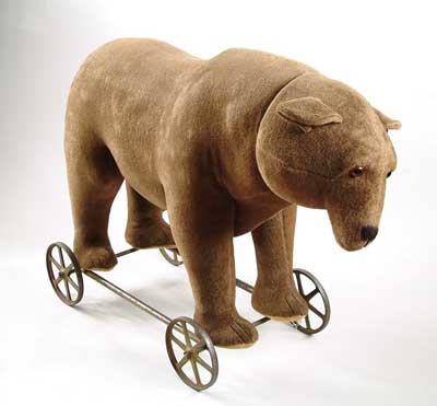 Appraisal: LARGE EARLY STUFFED BEAR ON WHEELS Attributed to Steiff ca