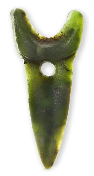 Appraisal: A rare Maori jade imitation shark tooth earring Rotorua area