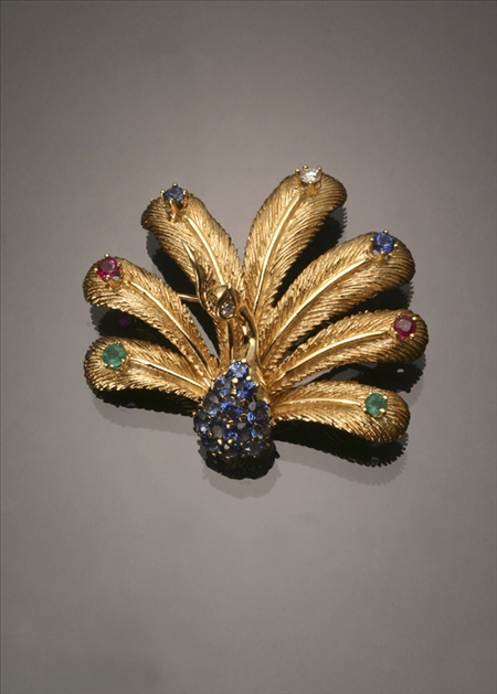 Appraisal: -Karat Yellow-Gold Diamond Blue Sapphire Ruby and Emerald Peacock Brooch