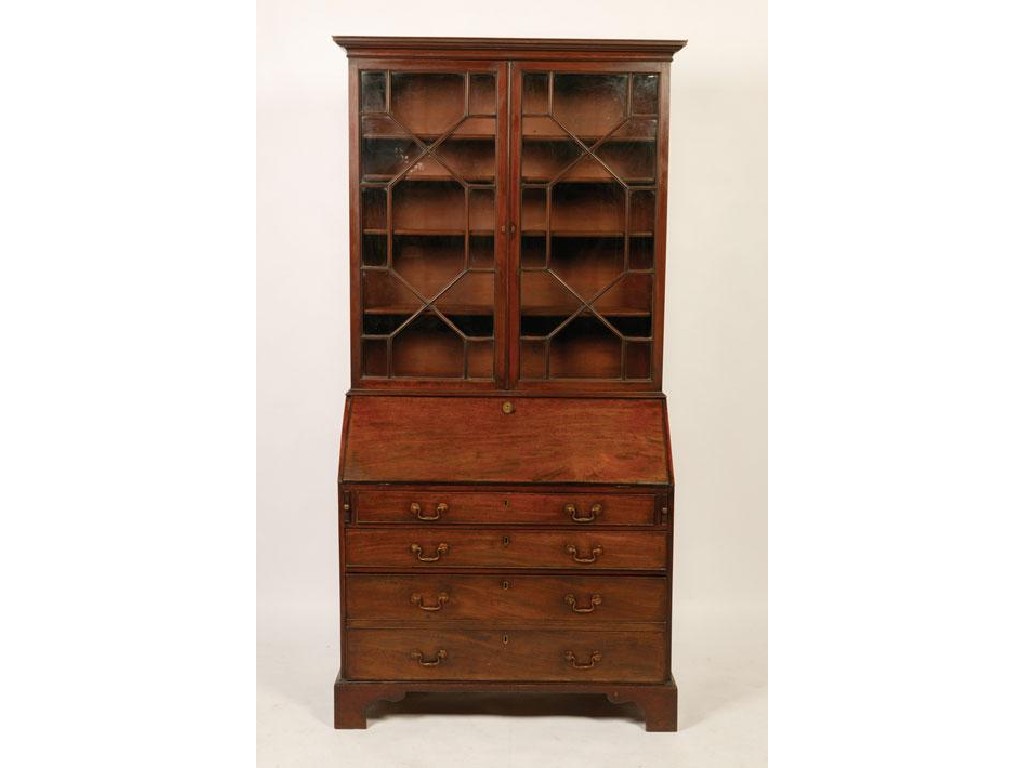 Appraisal: A GEORGE III MAHOGANY BUREAU BOOKCASE the upper section with