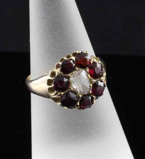 Appraisal: A Victorian ct gold garnet and diamond cluster ring the