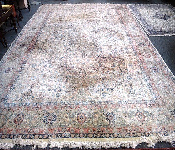 Appraisal: A Kerman carpet Persian the ivory field with an all