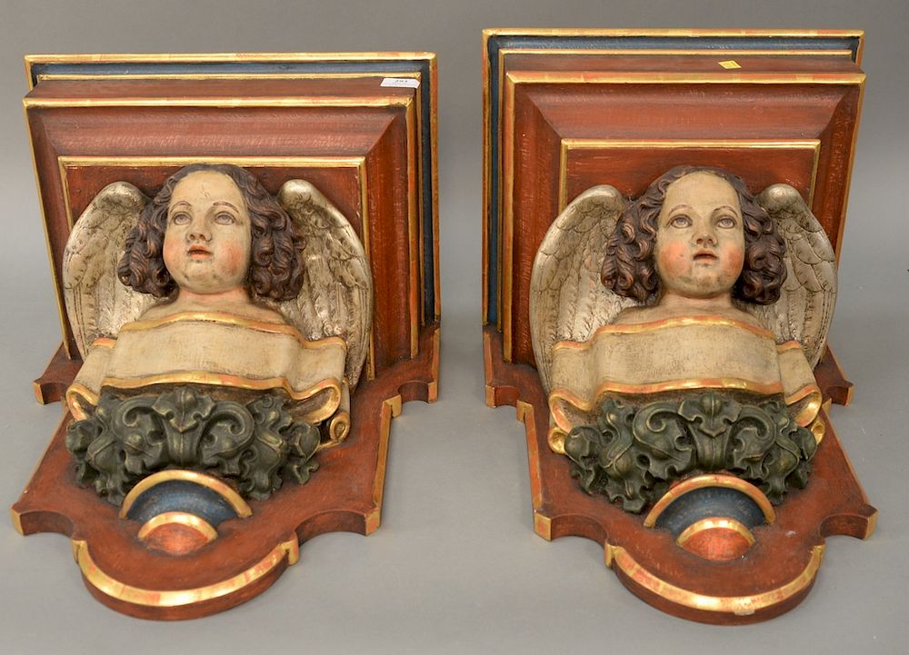 Appraisal: Pair large carved wood figural bracket shelves each having carved