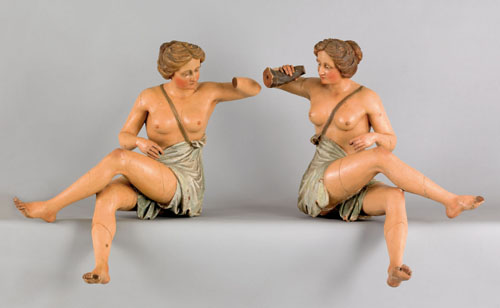 Appraisal: Exceptional pair of carved and painted female nudes ca probably