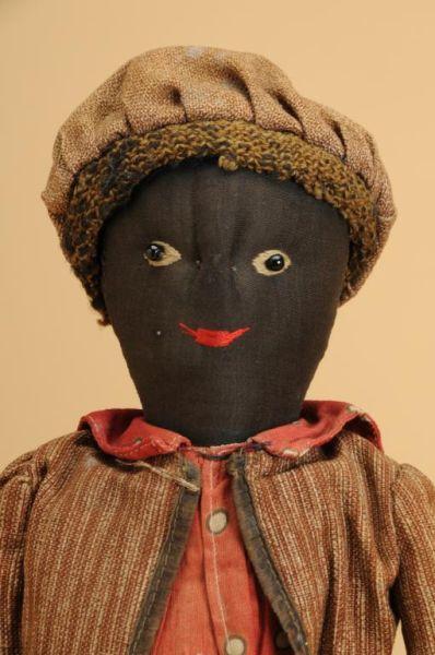 Appraisal: Early Black Folk Art Doll An interesting turn of the