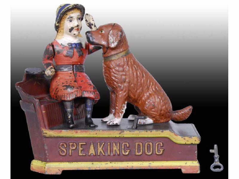 Appraisal: Speaking Dog Cast Iron Mechanical Bank with Key Description Red