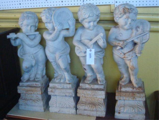 Appraisal: Cast Iron Cherub Garden Statues Painted White From a Long