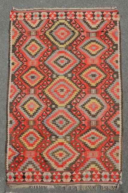 Appraisal: AN OLD TURKISH FLAT WEAVE KELIM RUG decorated three rows