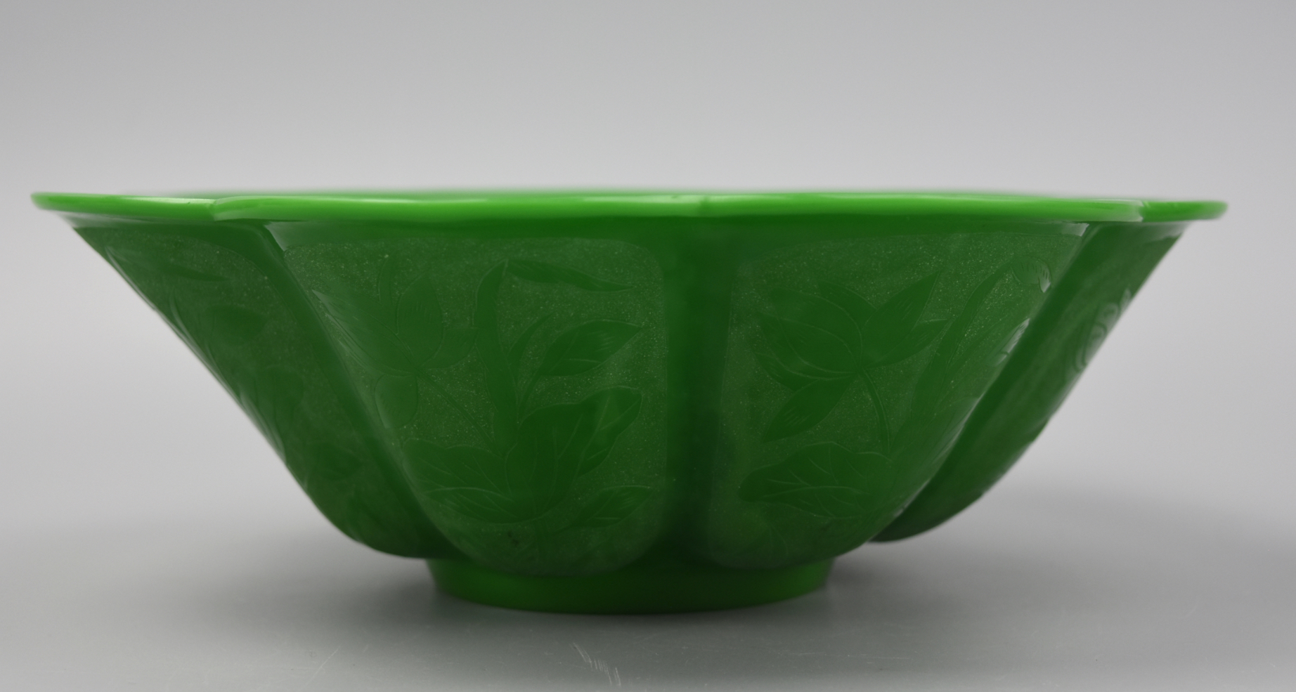 Appraisal: CHINESE LOBED GREEN GLASS BOWL W LOTUS FLOWER A Chinese