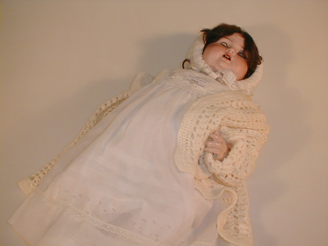 Appraisal: An Armand Marseille type bisque headed doll marked Germany