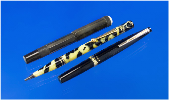 Appraisal: Three Interesting Items Eversharp Black and Pearl senior pencil with