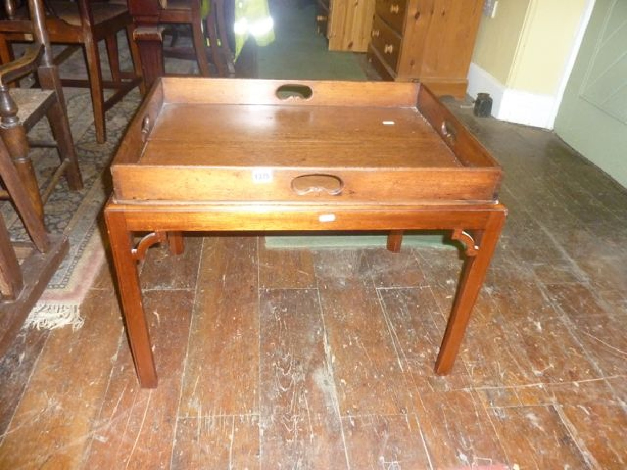 Appraisal: A Georgian style mahogany tray top occasional table with pierced