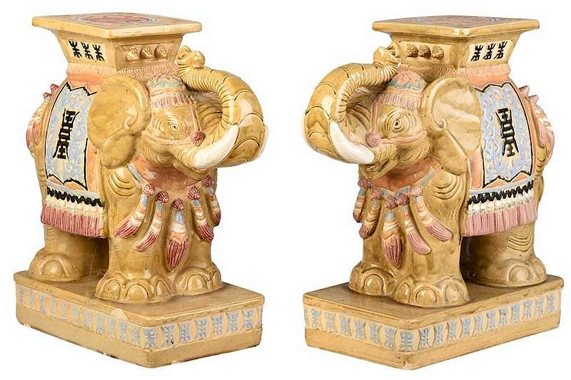 Appraisal: Pair of Glazed Elephant Stools th century tan glazed bodies