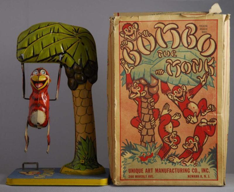 Appraisal: Unique Art Tin Wind-Up Bombo the Monk Toy Description Toy