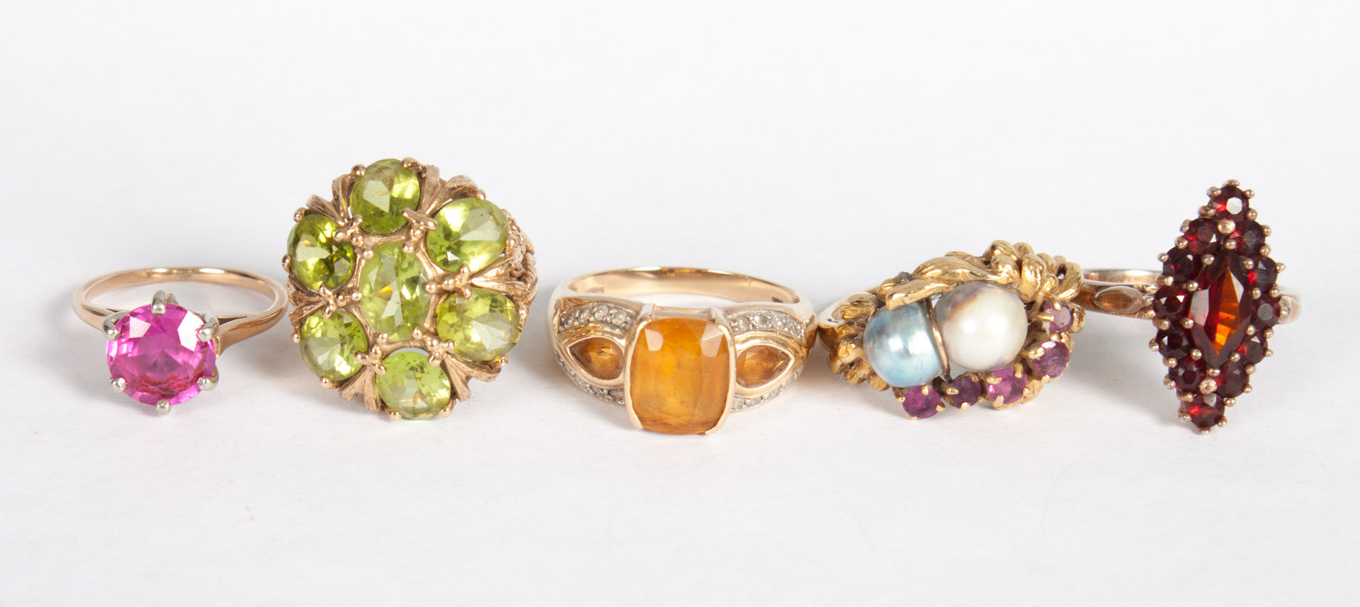 Appraisal: Five gold and colored stone rings K gold ruby pearl