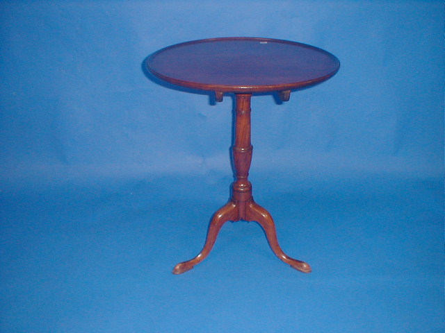 Appraisal: A thC mahogany circular tripod table with a tilt top