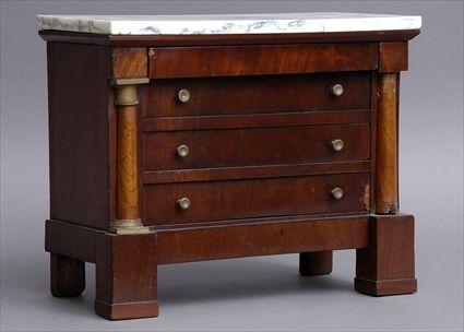 Appraisal: EMPIRE MAHOGANY MINIATURE COMMODE WITH MARBLE TOP The veined white