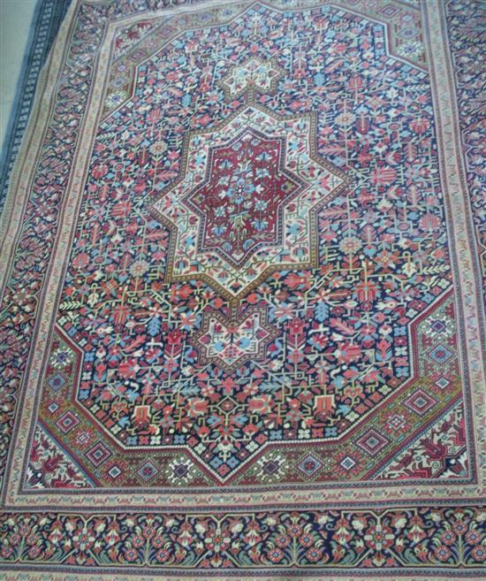 Appraisal: Qum rug with central medallion and matching spandrels h w