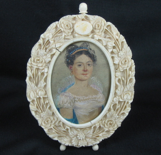 Appraisal: MINIATURE VICTORIAN OVAL PAINTING depicting a woman wearing tiara and