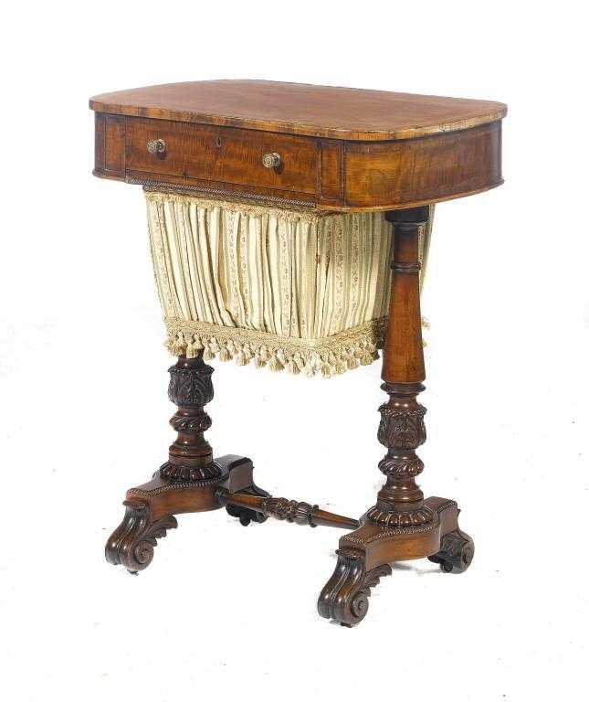 Appraisal: A GEORGE IV MAHOGANY WORK TABLE the bow ended top