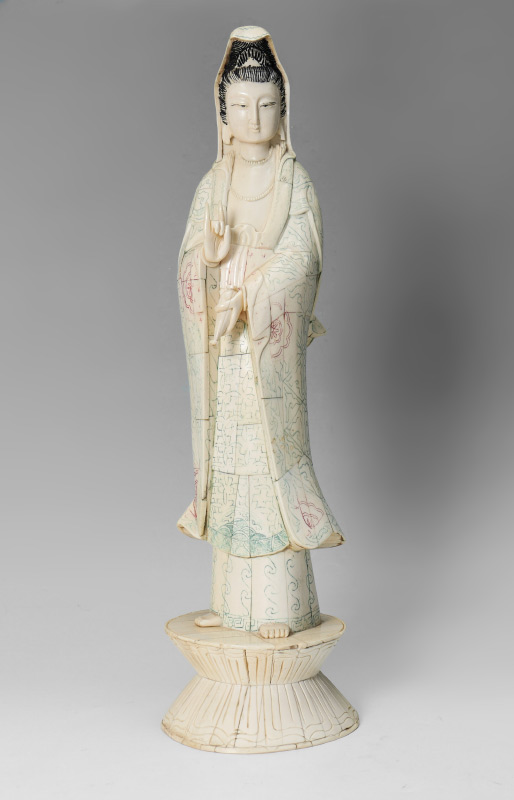 Appraisal: CHINESE BONE CLAD FIGURE OF QUAN YIN Quan Yin holding