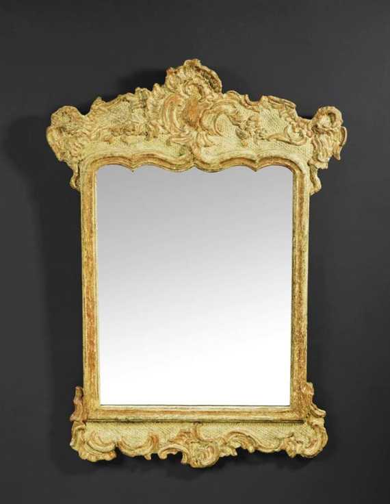 Appraisal: MIRROR late Baroque German th century Carved wood with traces