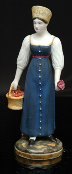 Appraisal: A RUSSIAN PORCELAIN FEMALE FIGURE Possibly Gardner th century Modelled