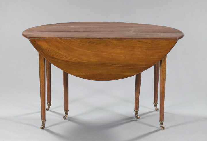 Appraisal: Louis XVI-Style Walnut Dining Table early th century the rectangular