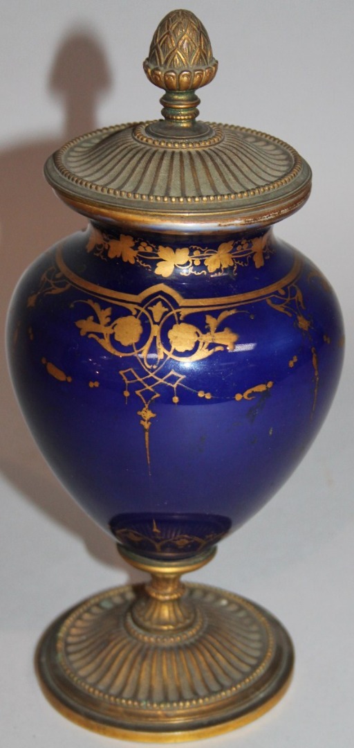 Appraisal: A thC French porcelain urnular vase the gilt bleu royale