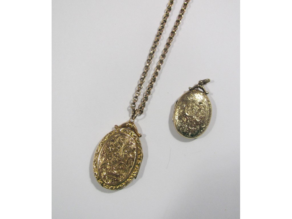 Appraisal: Lot comprising two Victorian engraved photo lockets one ct gold