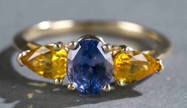 Appraisal: Blue and yellow sapphire kt gold ring A Blue and