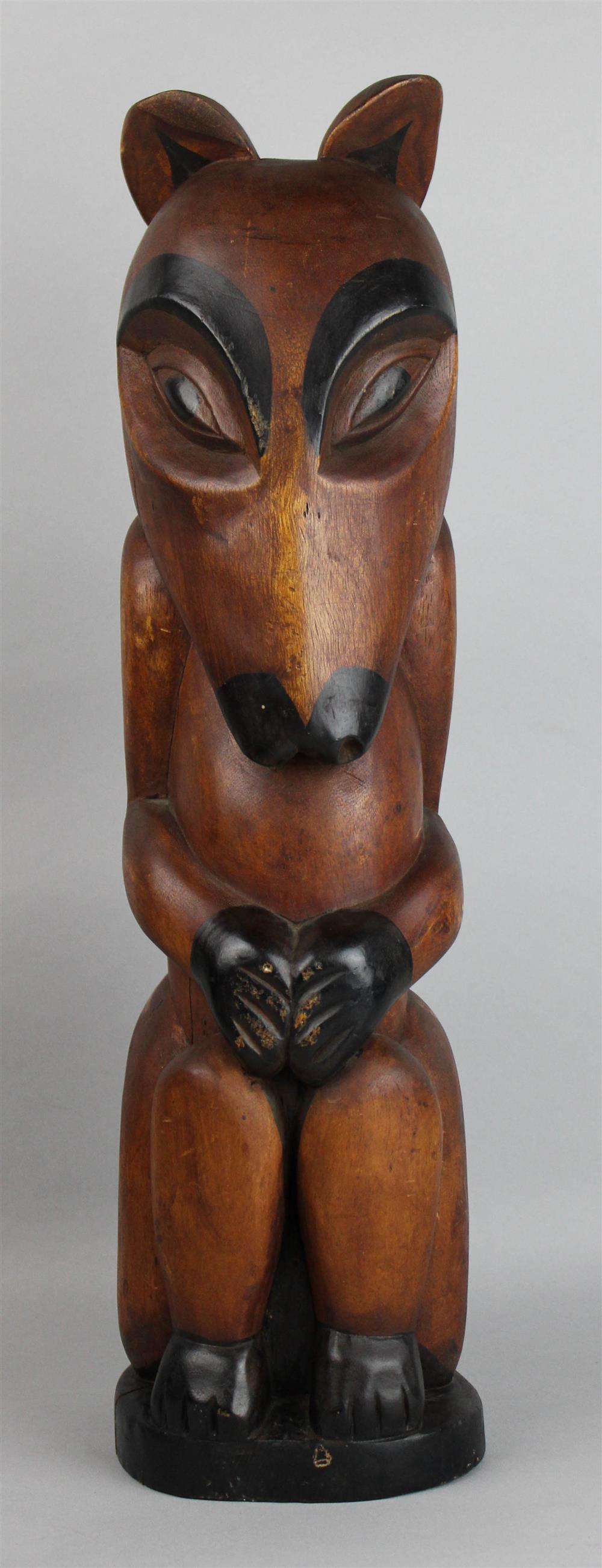 Appraisal: PACIFIC NORTHWEST COAST WOOD CARVING OF A WOLF BADGER h