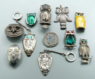 Appraisal: Eleven silver owl pins accessories five pins colored stones Mazer