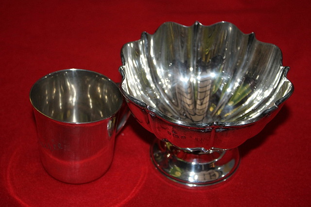 Appraisal: A SILVER BON BON DISH of stylised form on pedestal