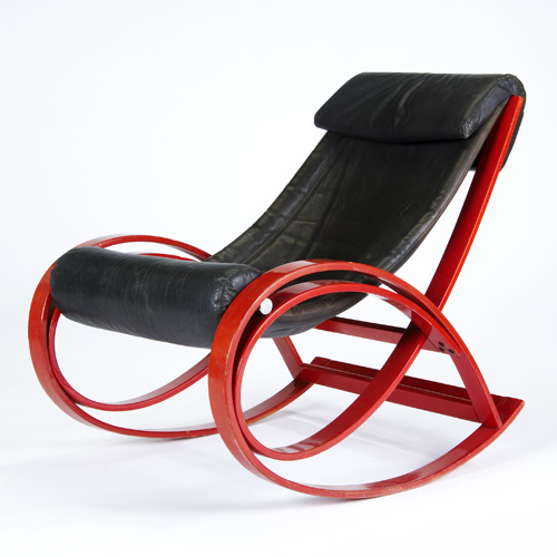 Appraisal: GAE AULENTI Red enameled wood rocking chair with black leather