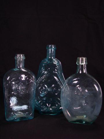 Appraisal: Group of three antique bottles including Union flask pint aqua