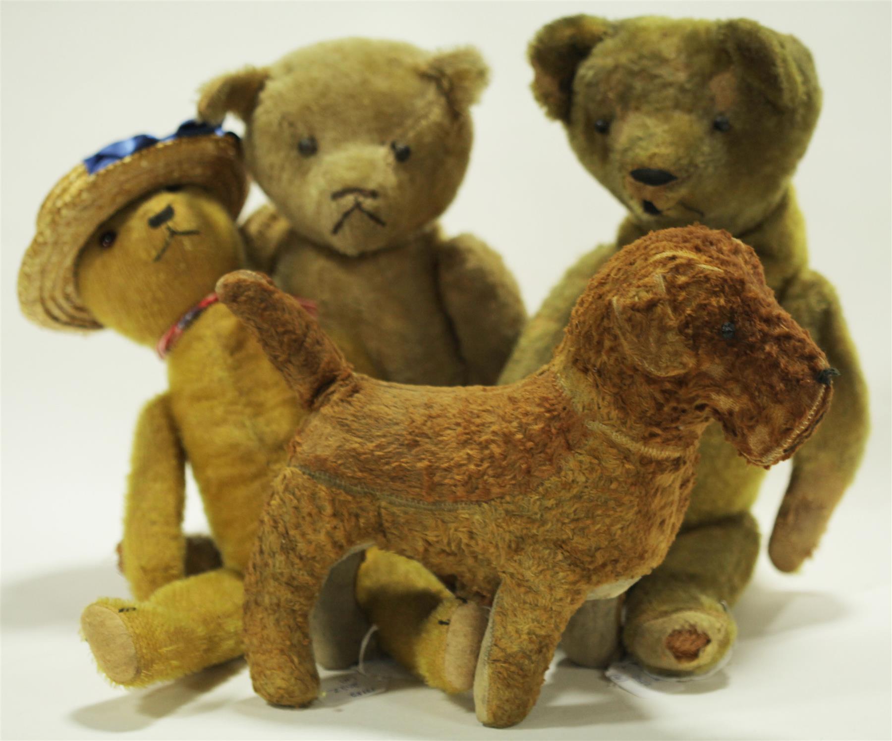 Appraisal: THREE MOHAIR BEARS DOG American or German early th century