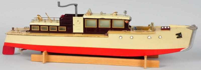 Appraisal: Orkin Cabin Cruiser Motorboat Clockwork Toy Description American Working Larger