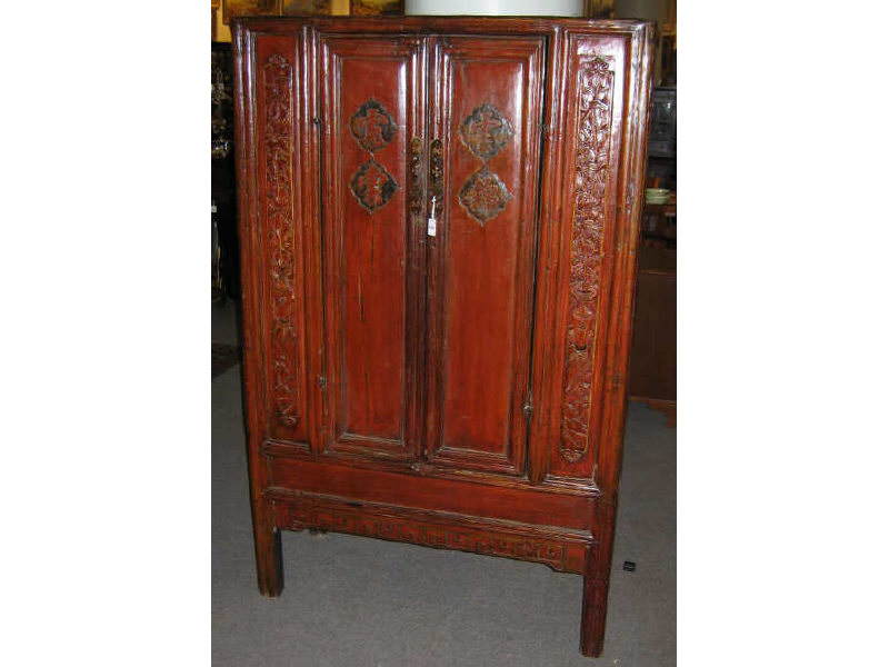 Appraisal: ASIAN RED LACQUERED TALL CABINET The front with two cupboard