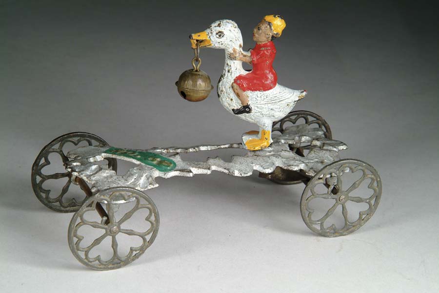 Appraisal: GOOSE WITH RIDER BELL TOY Manufactured by The Gong Bell