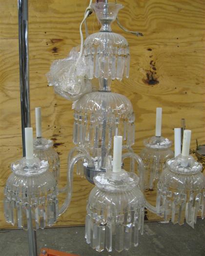 Appraisal: Cut glass chandelier The central standard issuing tiers each hung