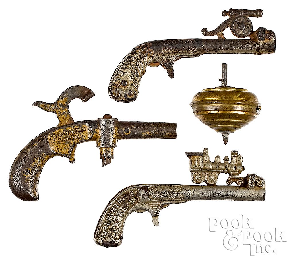 Appraisal: Three cast iron animated cap guns Three cast iron animated