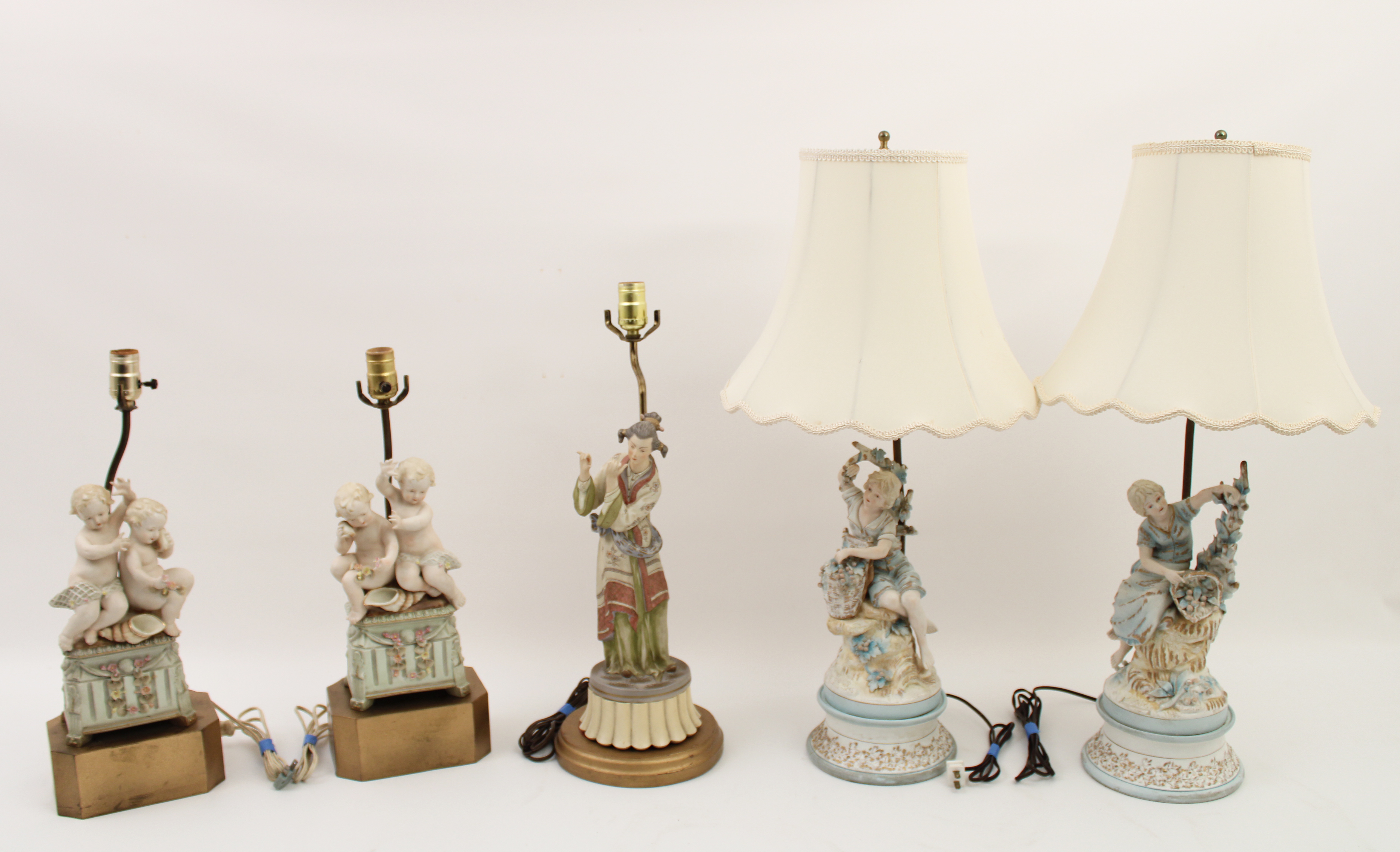 Appraisal: GROUP OF CONTINENTAL PORCELAIN LAMPS Group of Continental porcelain figural