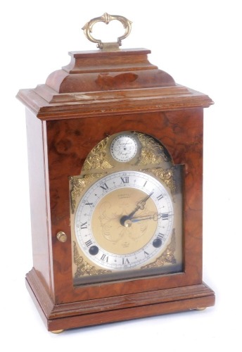 Appraisal: An Edwardian walnut Mundsey Co of Cambridge Elliott mantel clock